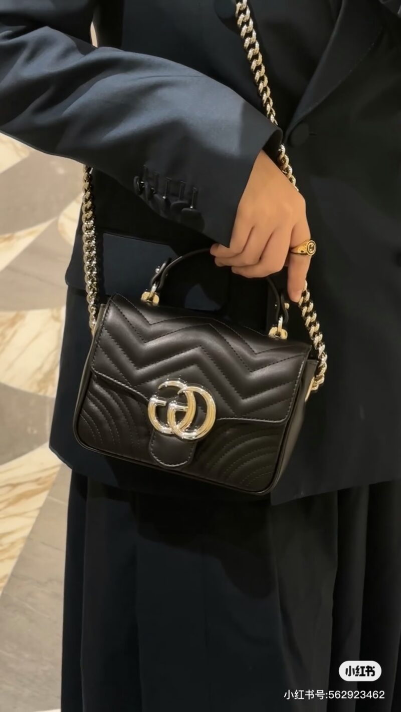 Gucci handheld chubby guy