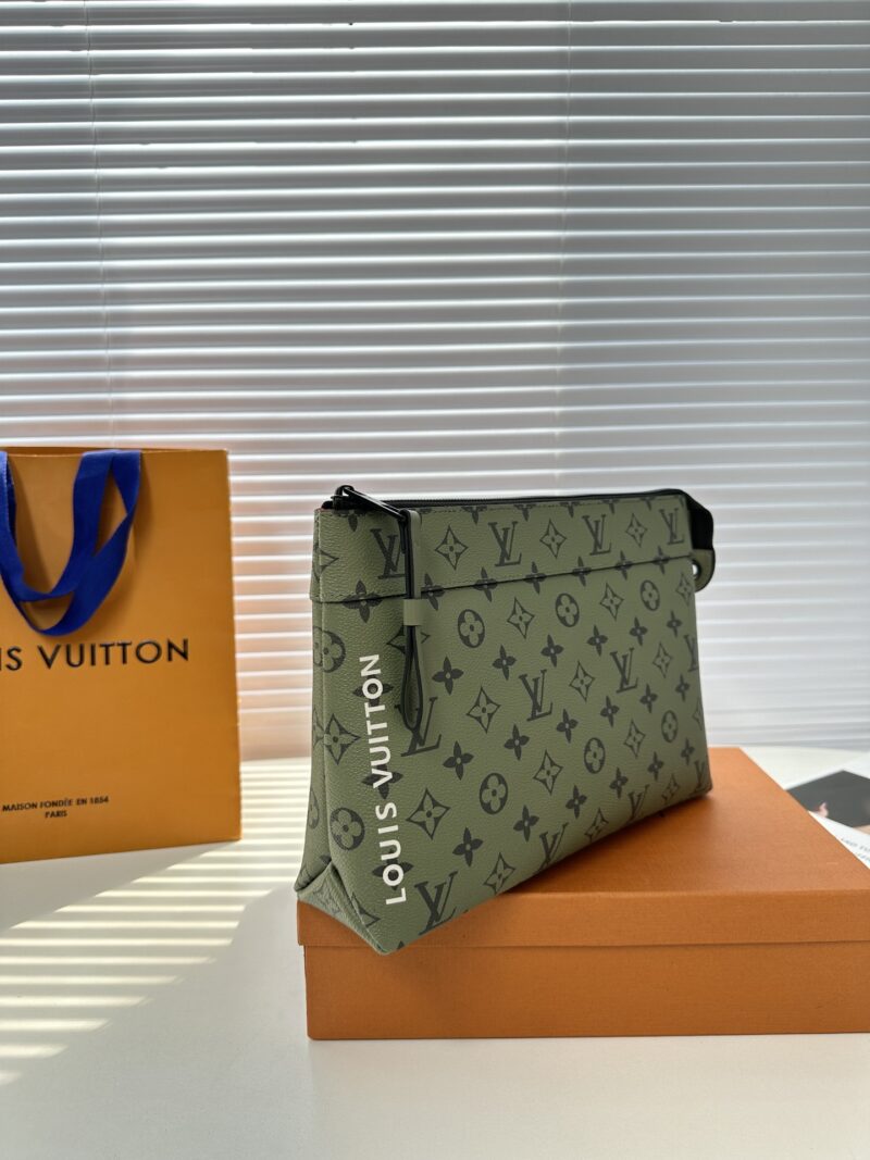 Comes with gift box M 82008 Green Flower Pochette Voyage Souple handbag made of soft Monogram Eclipse coated canvas, with rounded strokes outlining the classic Pochette Voyage handbag lines, providing a comfortable and portable experience. The slim d...