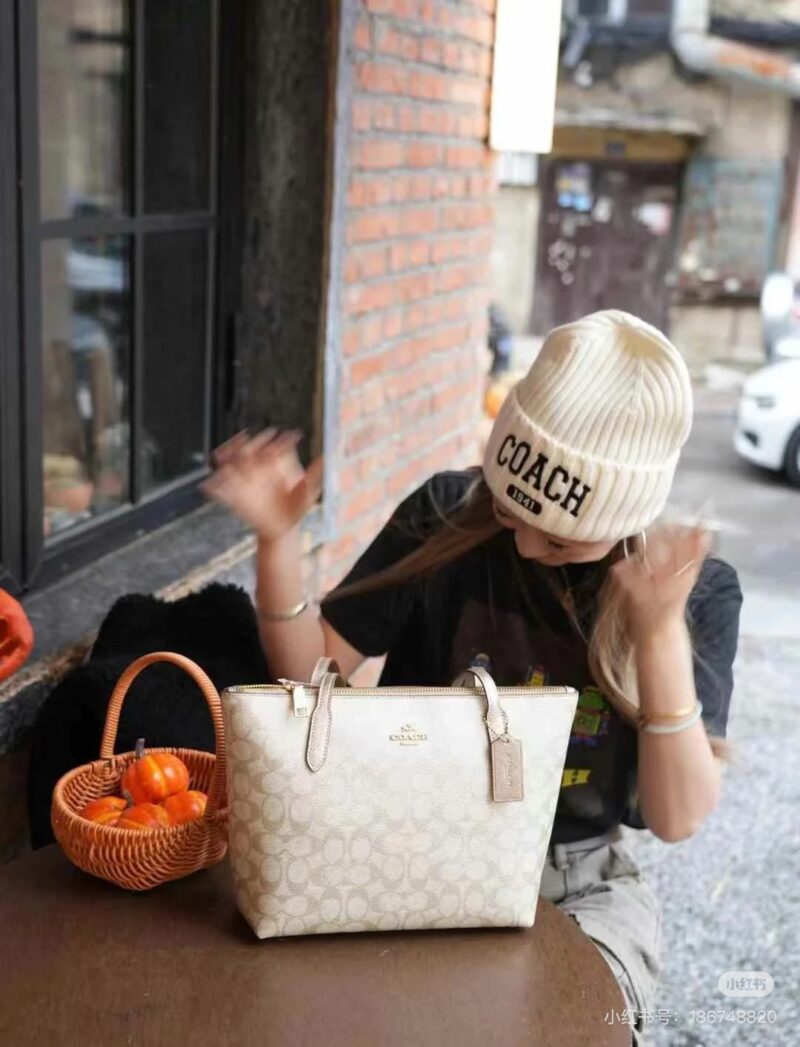 Coach pearl colored shopping bag