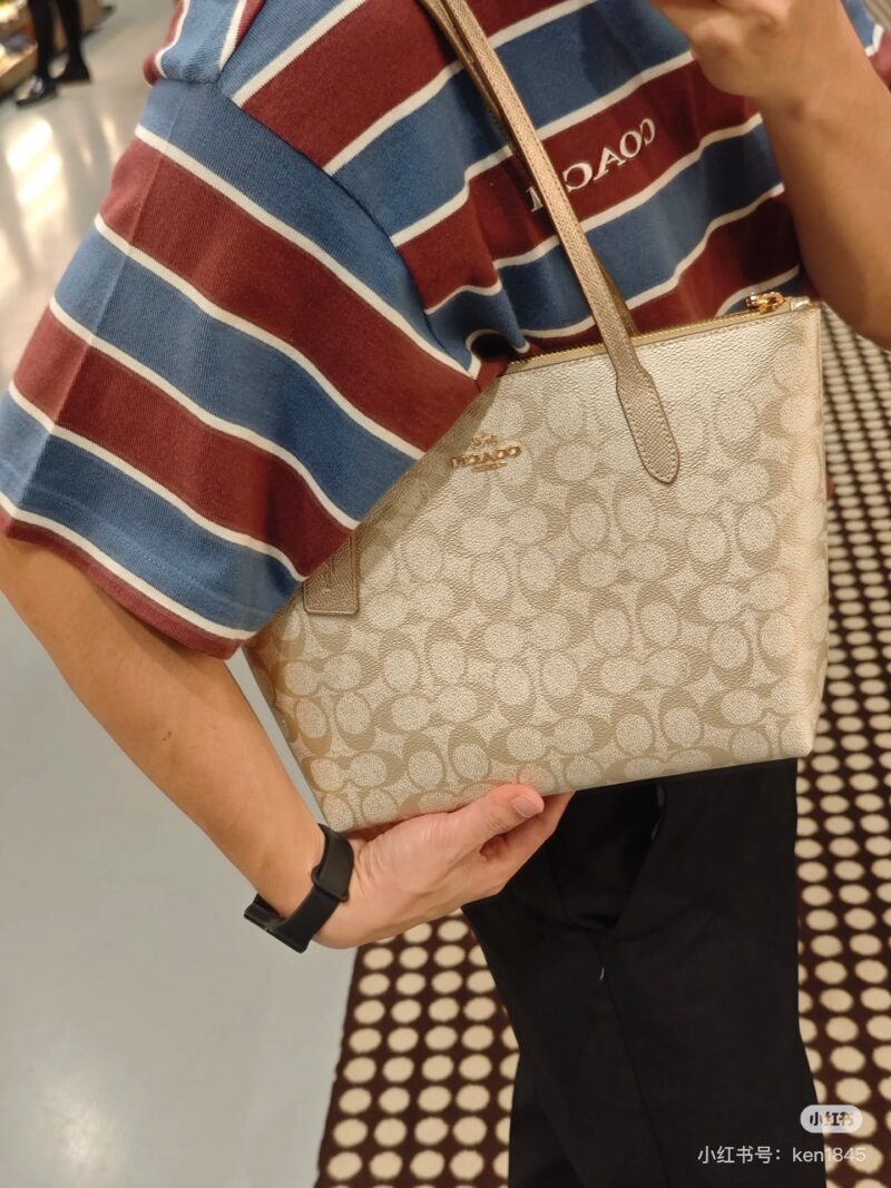 Coach pearl colored shopping bag