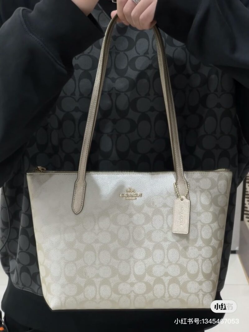 Coach pearl colored shopping bag