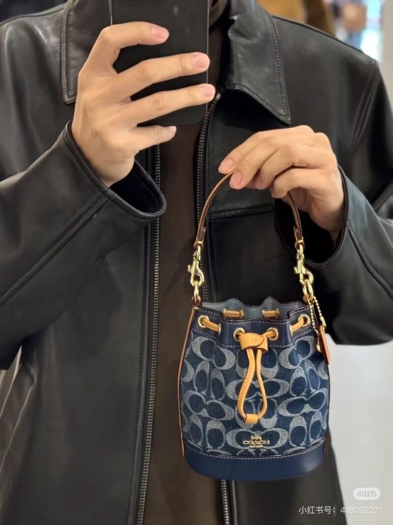 Coach denim small water bucket