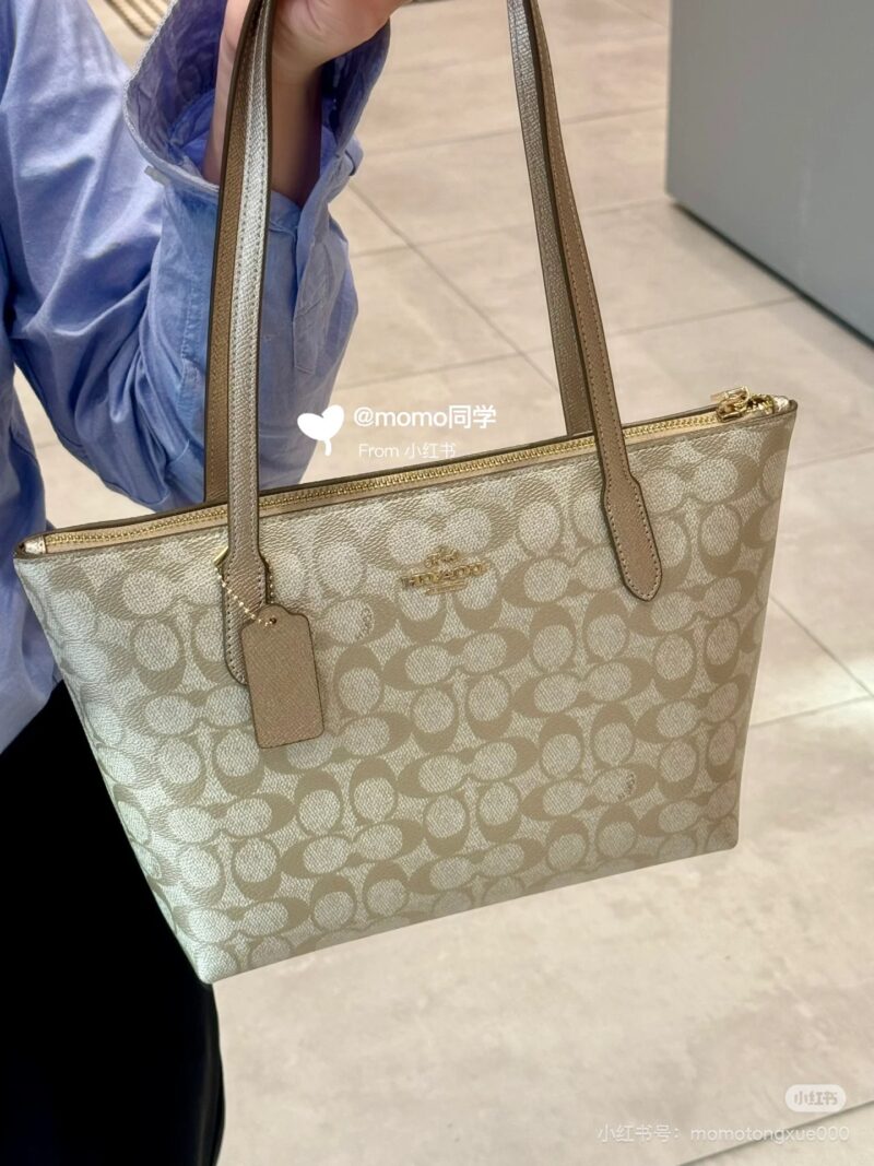 Coach pearl colored shopping bag