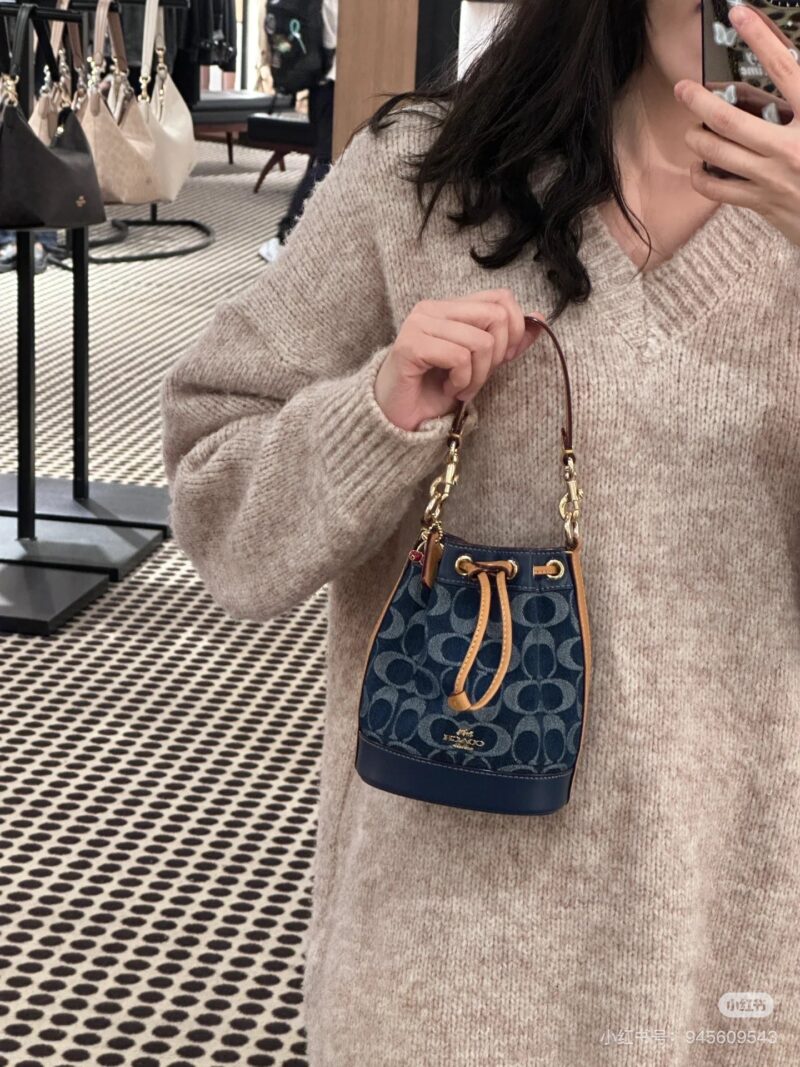 Coach denim small water bucket