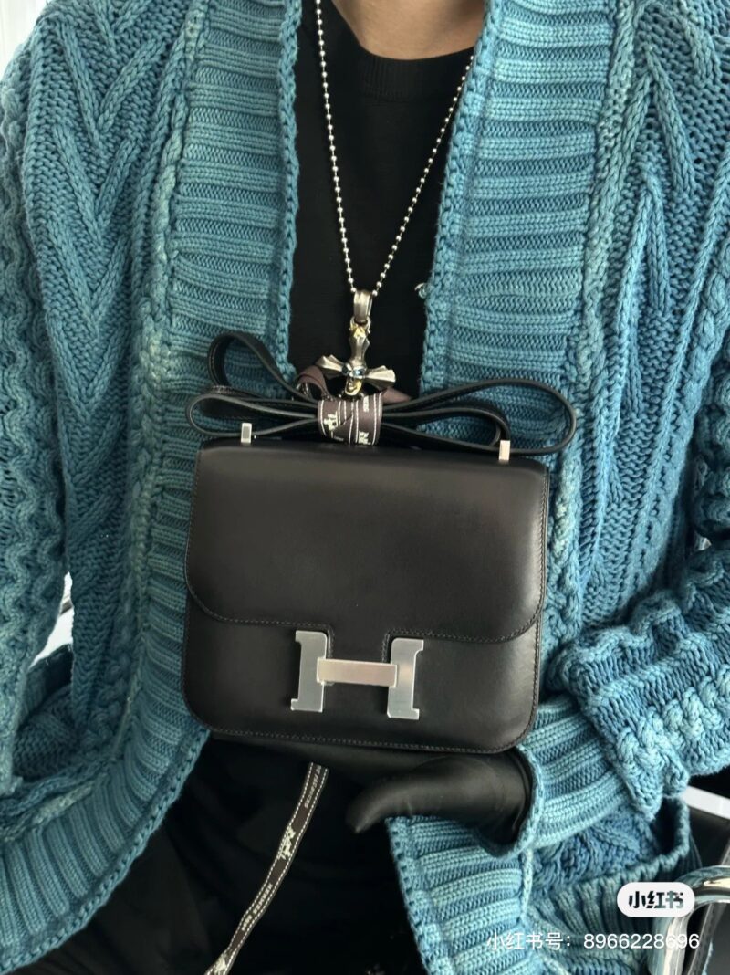 40f2ba1135.jpg Kangkang bag flat grain cowhide