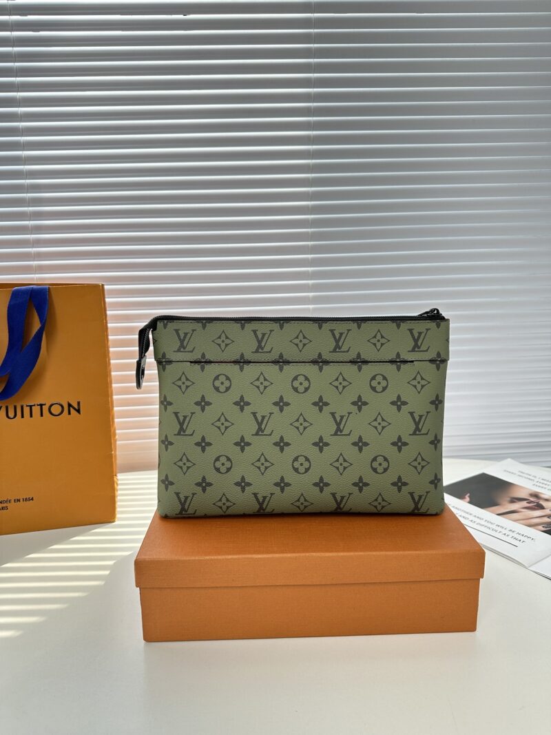 Comes with gift box M 82008 Green Flower Pochette Voyage Souple handbag made of soft Monogram Eclipse coated canvas, with rounded strokes outlining the classic Pochette Voyage handbag lines, providing a comfortable and portable experience. The slim d...