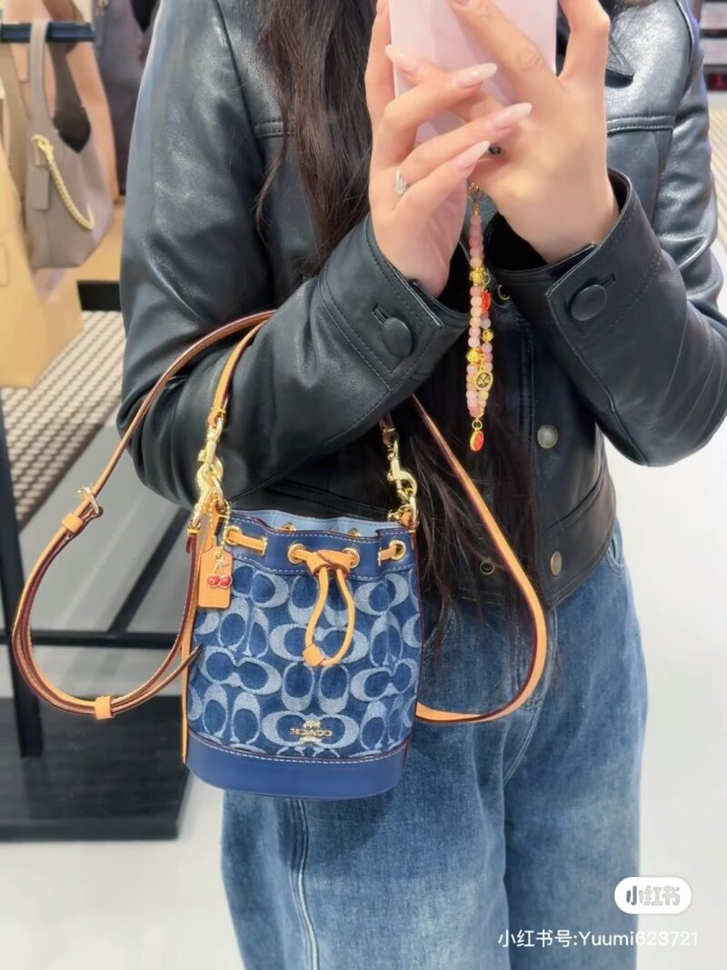 Coach denim small water bucket