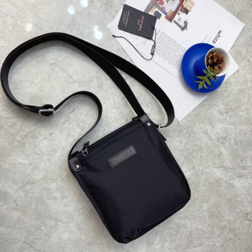 655ee16073.jpg Pure original top quality latest single shoulder crossbody bag mobile phone bag high-end luxury original board imported waterproof fabric with cowhide luxury triangle mark hardware, clear logo, quality absolutely comparable to the original, mini vers...