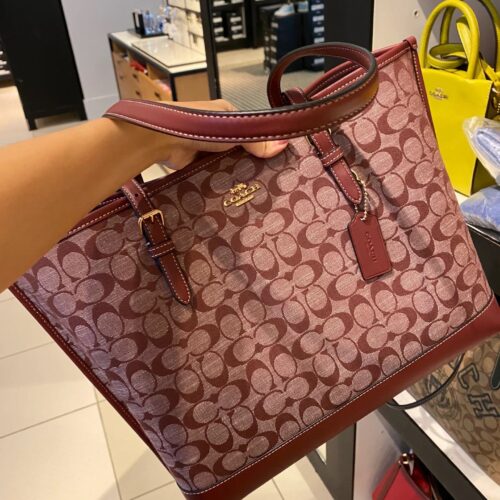 Coach Basket of Red Flowers