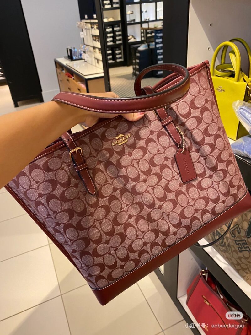Coach Basket of Red Flowers