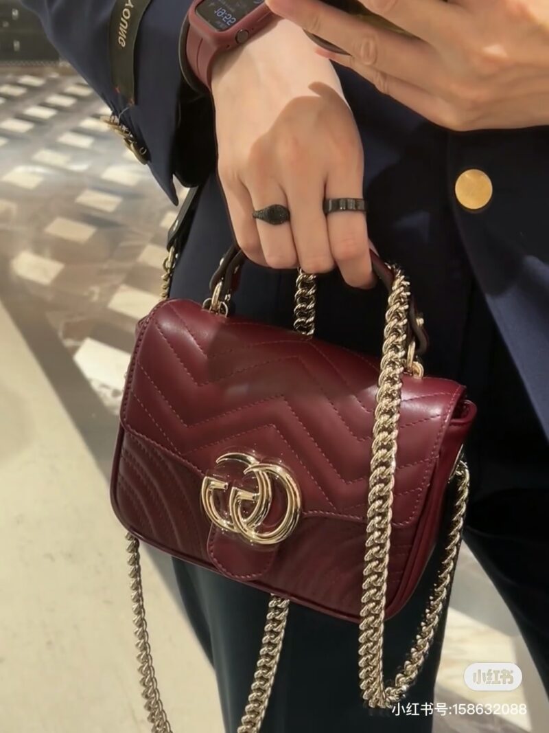 Gucci handheld chubby guy