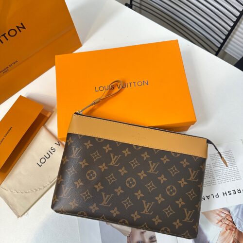 Exclusive real-life shot of M14057 vintage Pochette Voyage Souple handbag with gift box. Made of soft Monogram Eclipse coated canvas, the classic Pochette Voyage handbag lines are outlined with rounded strokes, providing a comfortable and portable ex...
