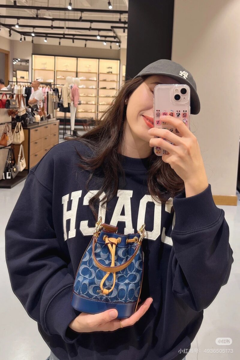 Coach denim small water bucket
