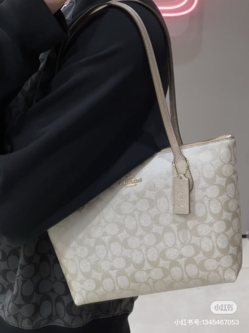 Coach pearl colored shopping bag
