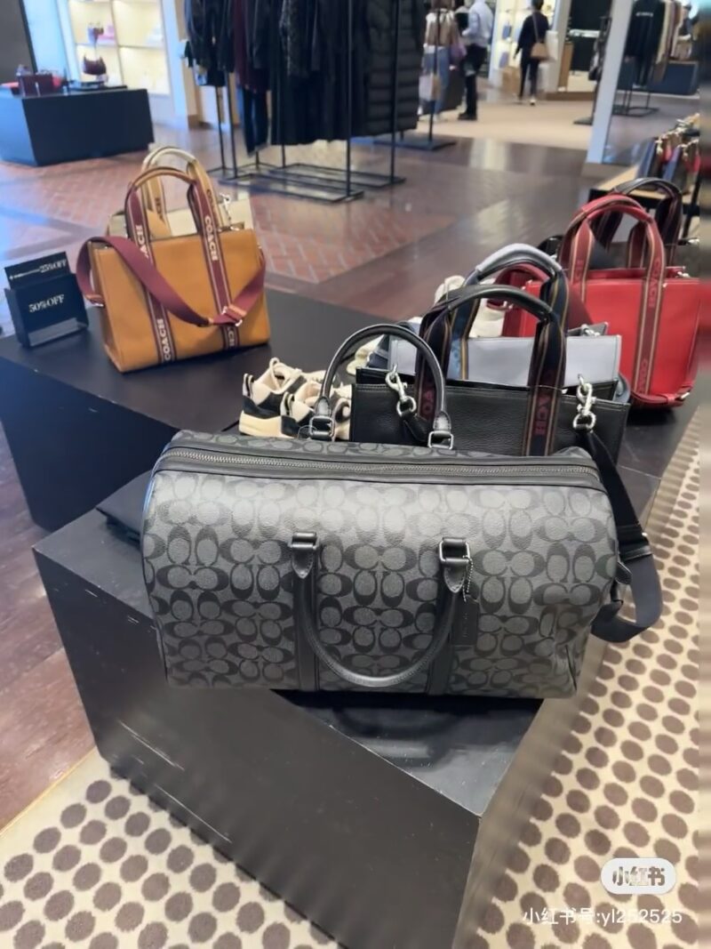 c3975c733d.jpg Coach Travel Black Flower