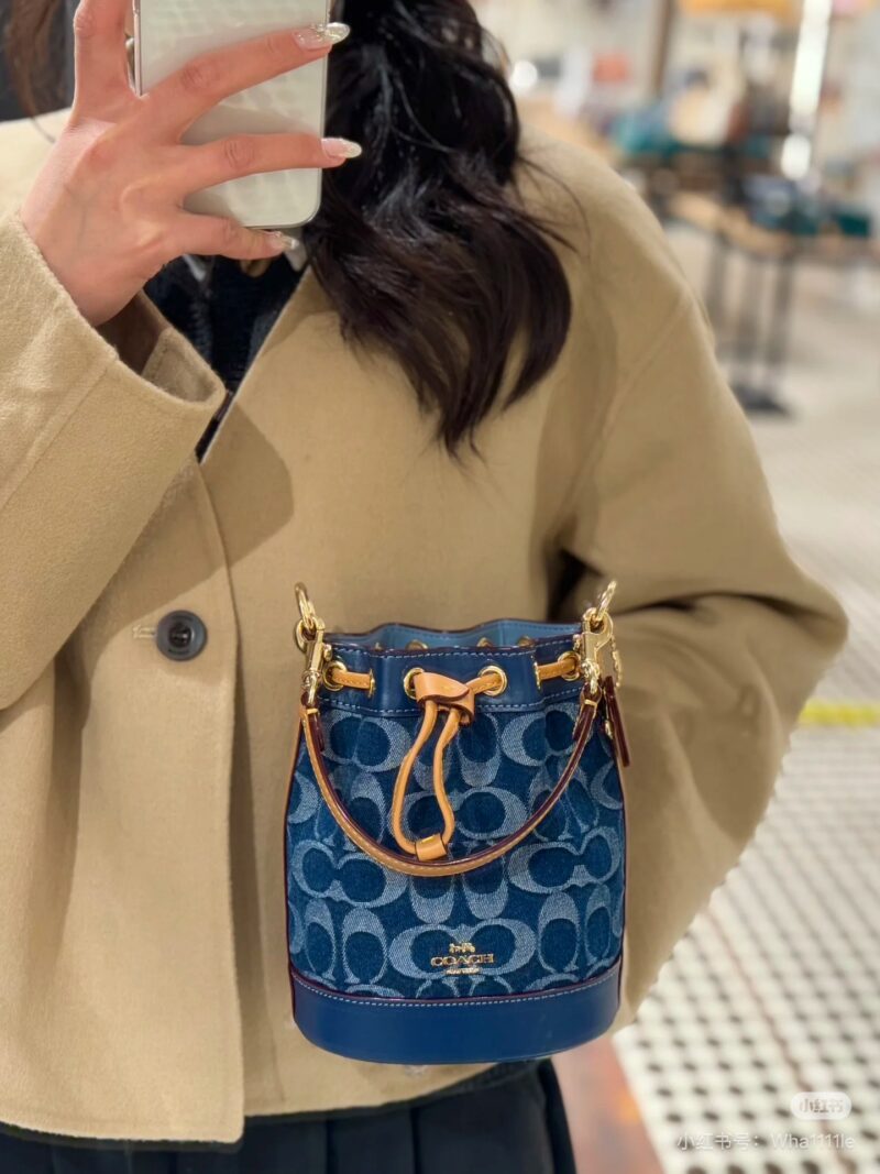 Coach denim small water bucket