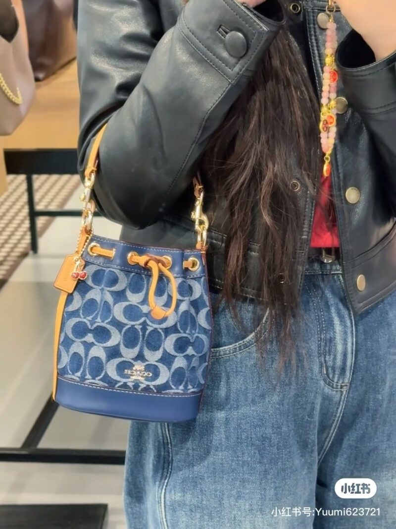 Coach denim small water bucket