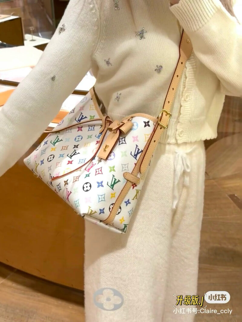 Got LV white tri color carryall