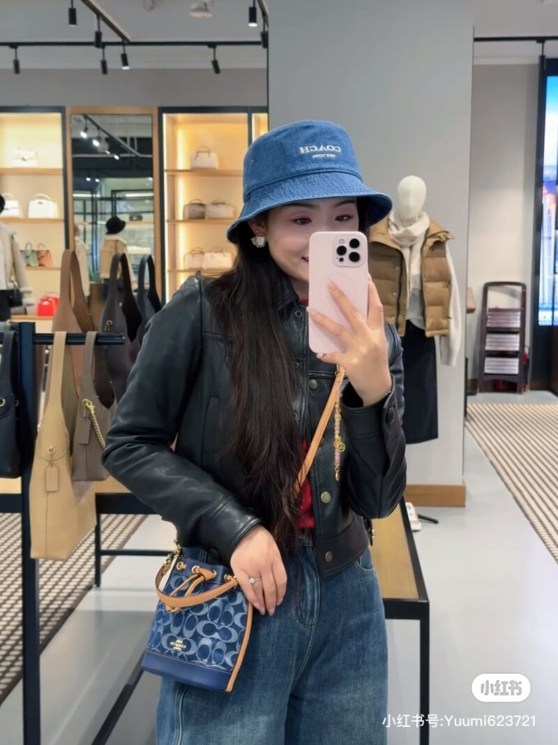 Coach denim small water bucket