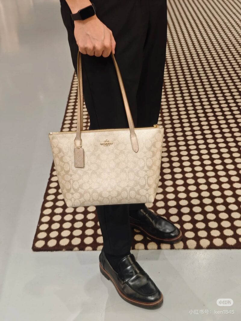 Coach pearl colored shopping bag