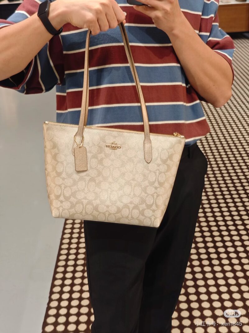 Coach pearl colored shopping bag
